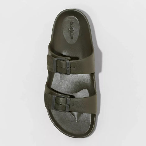 Green sandal with a buckle on a light gray background