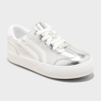Silver sneaker on a light gray background