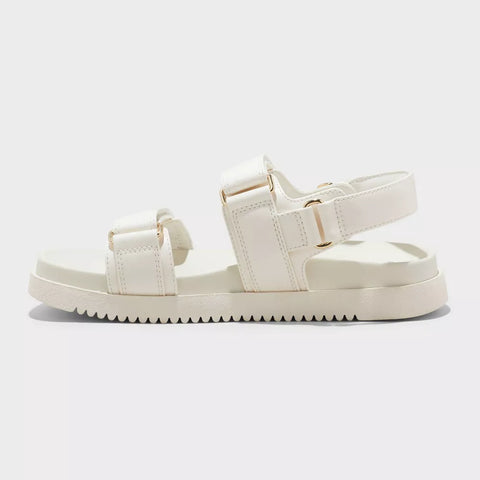 White sandal with a platform sole on a light gray background