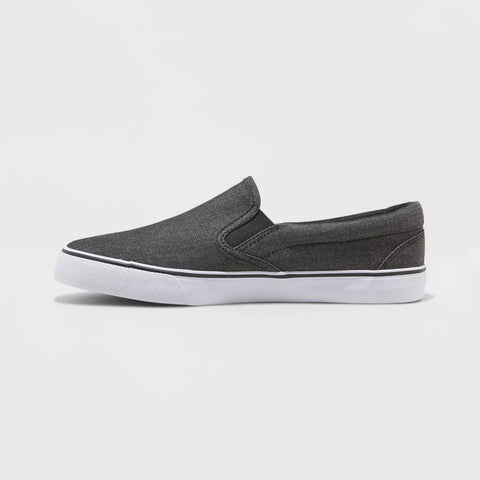 Gray slip-on shoe with white sole on a light gray background