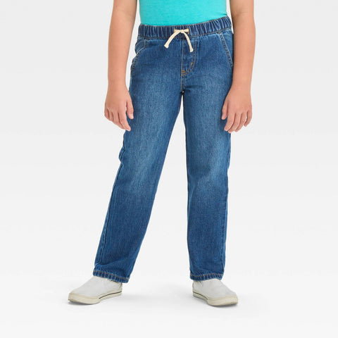 Person wearing blue jeans on a white background