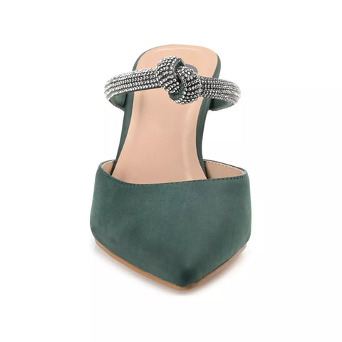Green sandal with a decorative strap on a white background