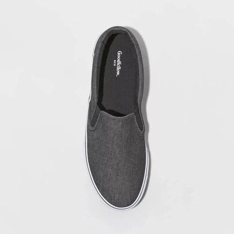 Gray slip-on shoe with white sole on a light gray background