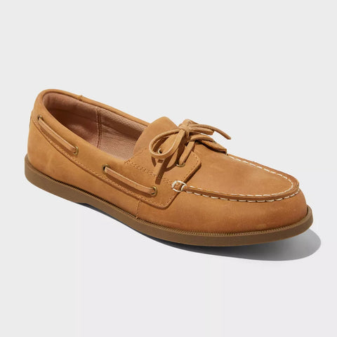 Tan leather boat shoe on a white background