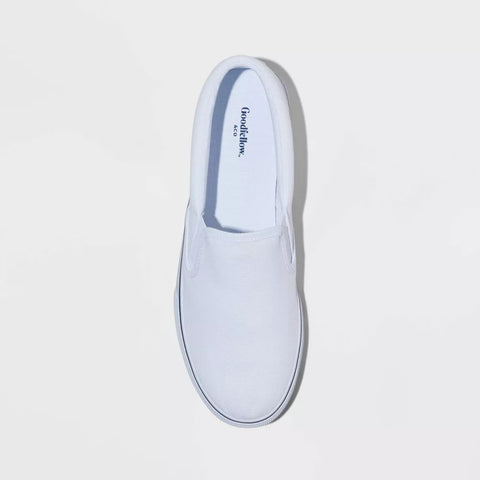 White slip-on shoe on a light gray background