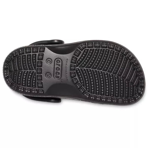 Black rubber sole of a shoe with brand logo on a white background