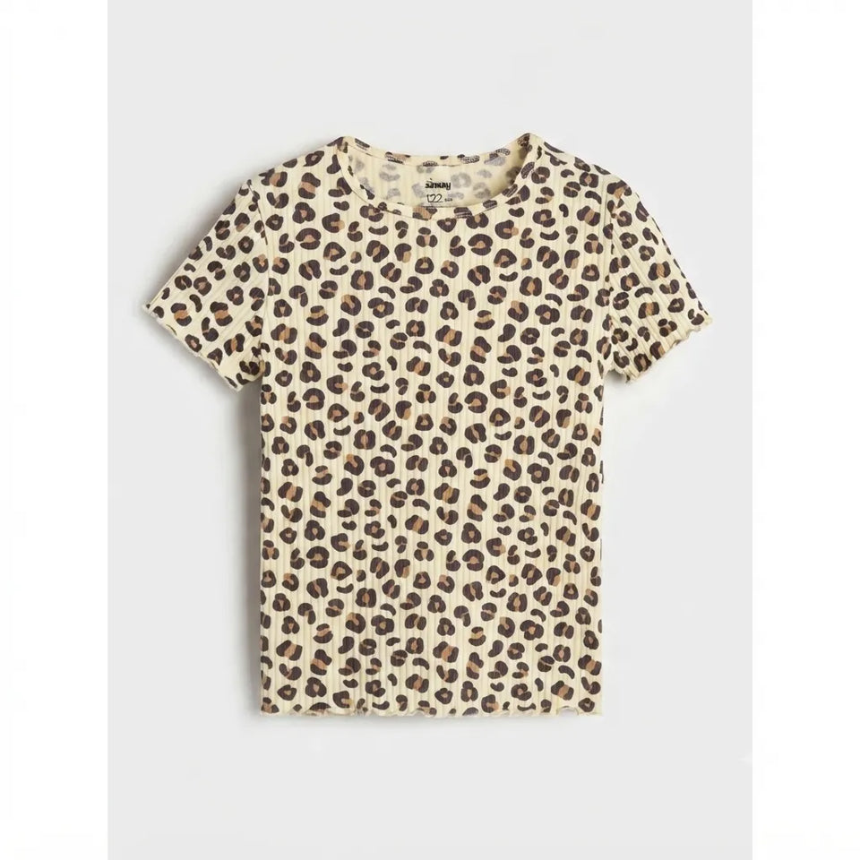A short-sleeve crewneck t-shirt with an all-over leopard print pattern in beige, brown, and black, displayed flat against a light gray background.