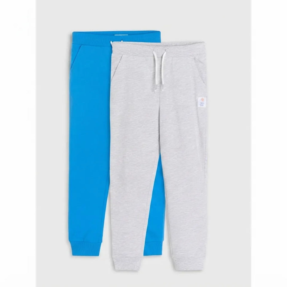 Two pairs of children's sweatpants, one in heather gray and one in bright blue, displayed flat against a light gray background.