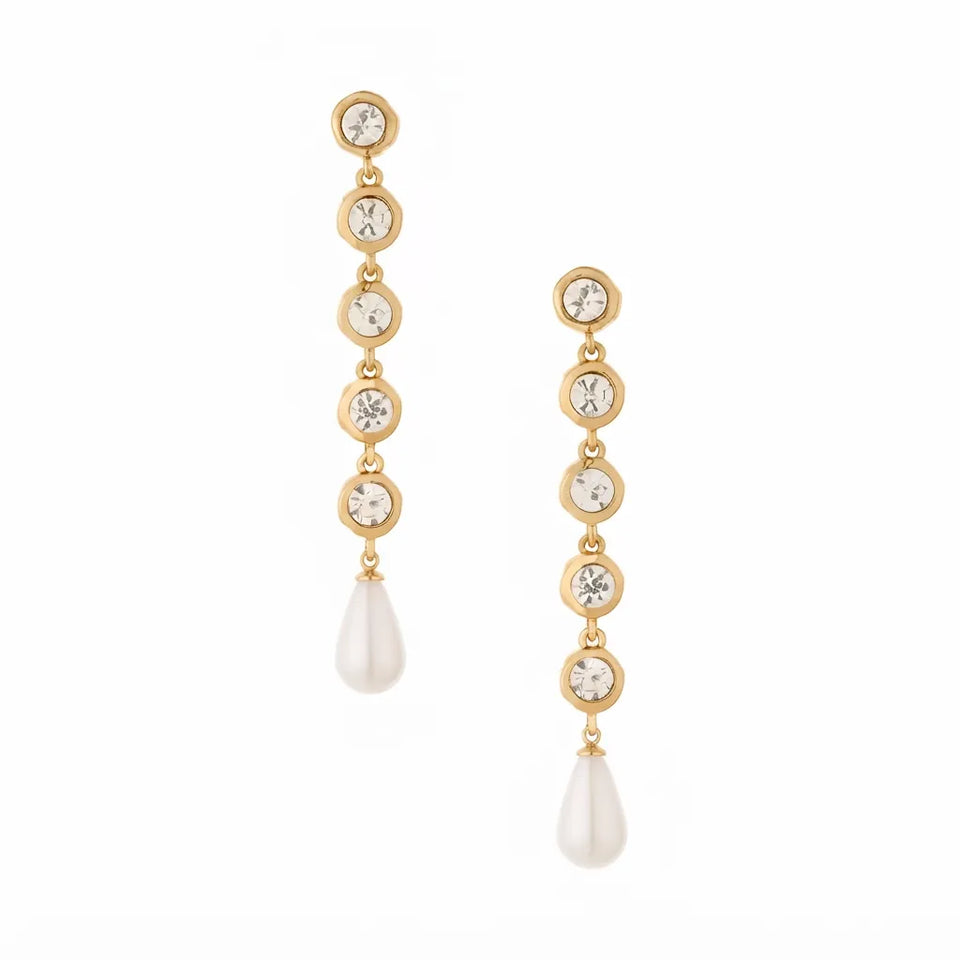 A pair of gold drop earrings with five clear round crystals and a teardrop-shaped white pearl at the bottom, shown on a plain white background.