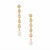 A pair of gold drop earrings with five clear round crystals and a teardrop-shaped white pearl at the bottom, shown on a plain white background.