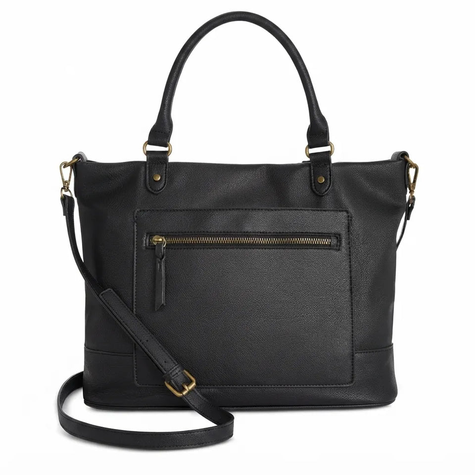 A black faux-leather handbag with dual top handles, a front zippered pocket, and a detachable shoulder strap, shown on a plain white background.