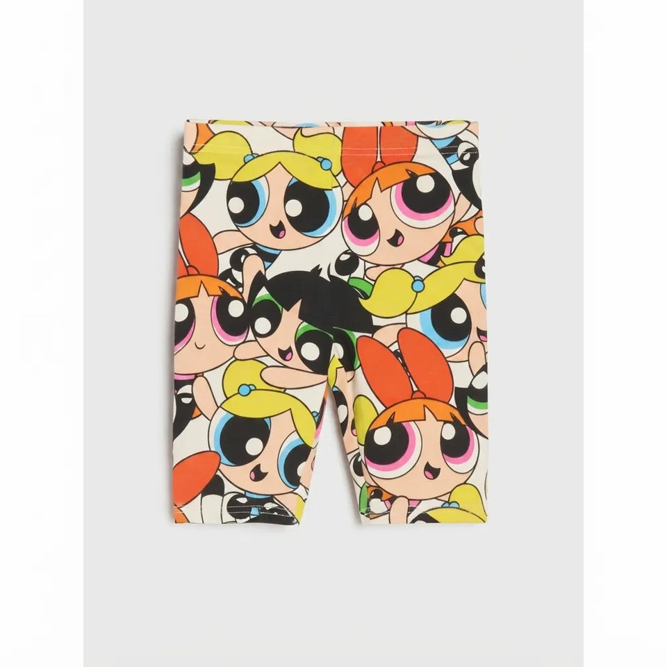 A pair of children's leggings featuring an all-over cartoon print of the Powerpuff Girls, shown flat against a light gray background.