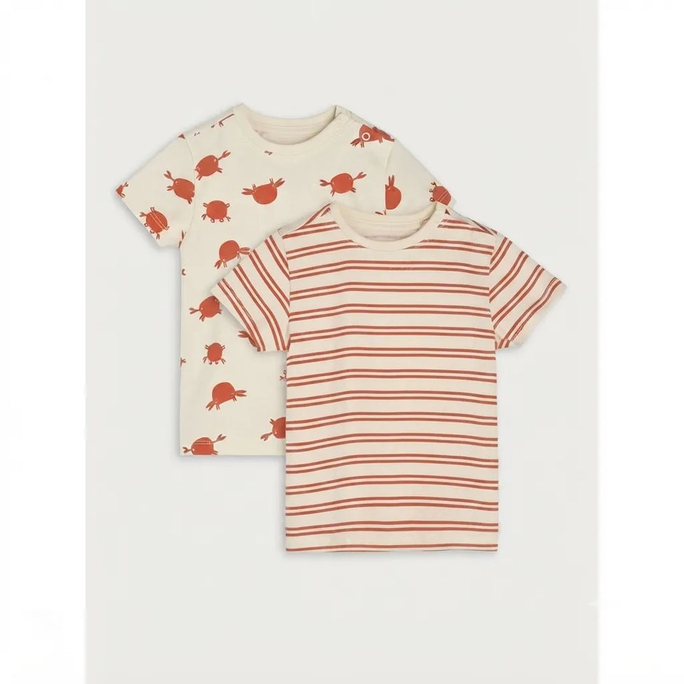 Two short-sleeve children's T-shirts laid flat on a light gray background. The front shirt has thin horizontal rust-orange stripes on an off-white base, and the back shirt has an off-white base with scattered rust-orange turtle prints.