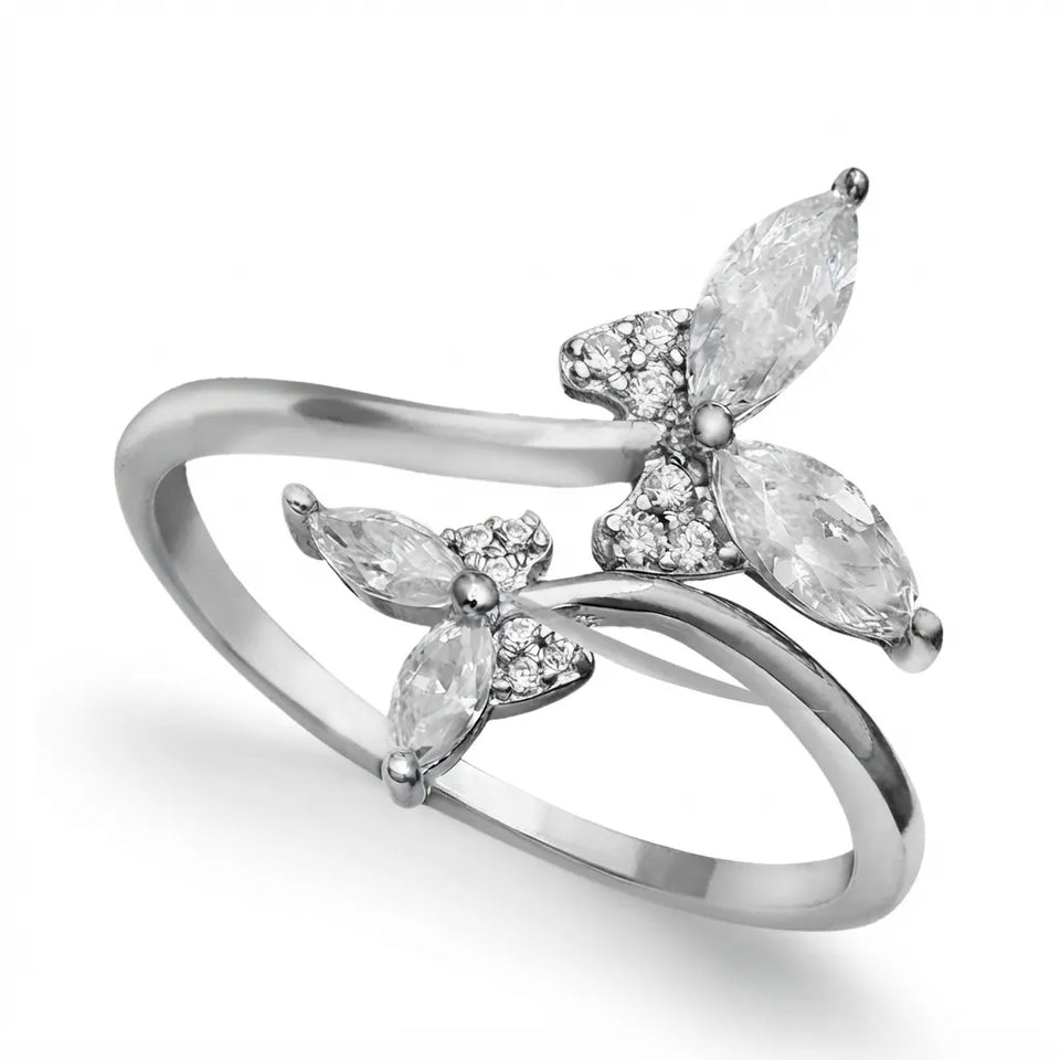 A silver butterfly ring featuring marquise-cut clear gemstones in a polished silver-tone setting, photographed on a clean white background.