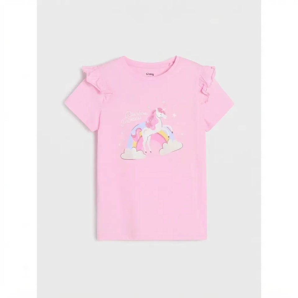 A pink short-sleeve baby tee with ruffled shoulders and a colorful unicorn graphic on the front, displayed against a light gray background.