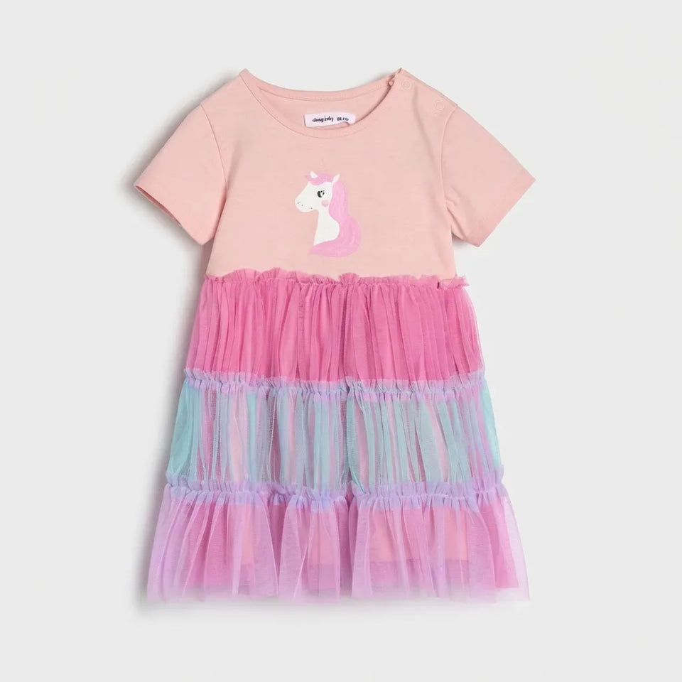 A toddler girl's short-sleeve dress by Mary Jane, featuring a light pink t-shirt with a white and pink unicorn graphic on the chest, and a tiered tulle skirt in vibrant pink, light blue, and lavender.
