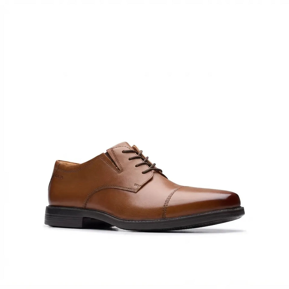 A single men's brown leather lace-up dress shoe with a cap toe and dark sole, shown in a side profile on a white background.