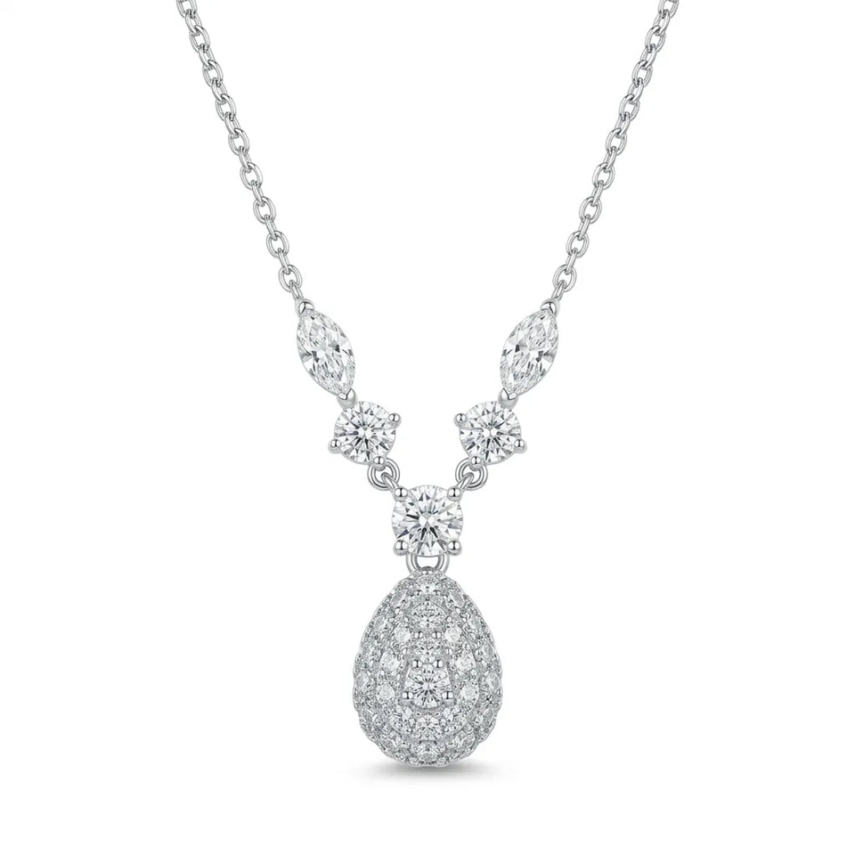 A silver-tone diamond necklace featuring a teardrop-shaped pendant pavé set with clear stones, accented by marquise and round diamond details on the chain, shown against a plain white background.