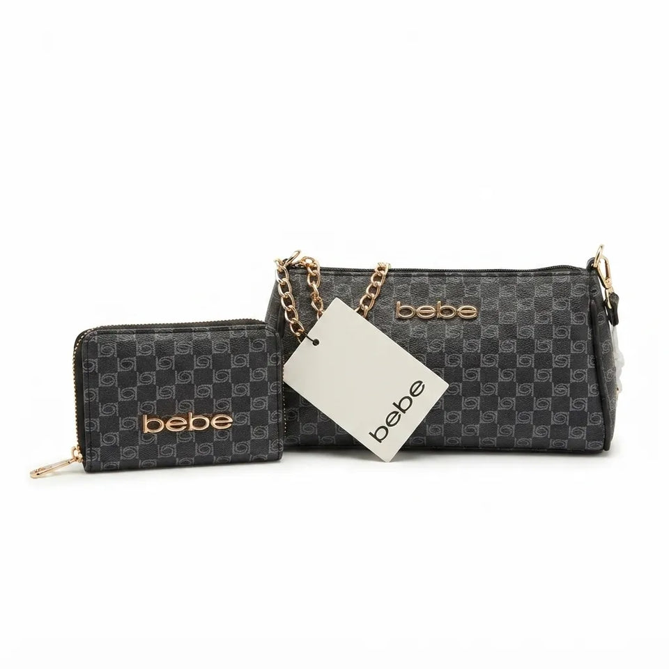 A matching two-piece handbag set consisting of a small zip-around wallet and a larger shoulder bag, both in a dark gray and black monogram pattern with gold-tone hardware and the brand name 'bebe' printed in gold on the front. A white paper tag with the 'bebe' logo is attached to the bag.