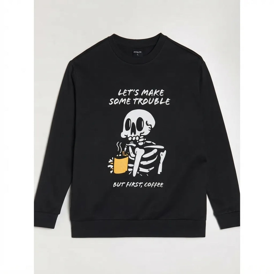 A black crewneck sweatshirt featuring a white skeleton graphic holding a yellow coffee mug, with the text 'LET'S MAKE SOME TROUBLE BUT FIRST COFFEE' printed on the front.