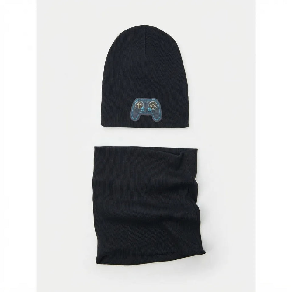A black knit beanie and matching neck gaiter set laid flat on a light gray background. The beanie features a small embroidered blue and gray game controller motif on the front.