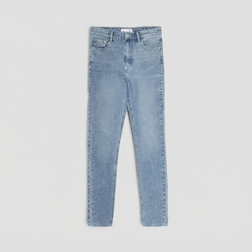 Light wash blue denim jeans shown flat against a light gray background.