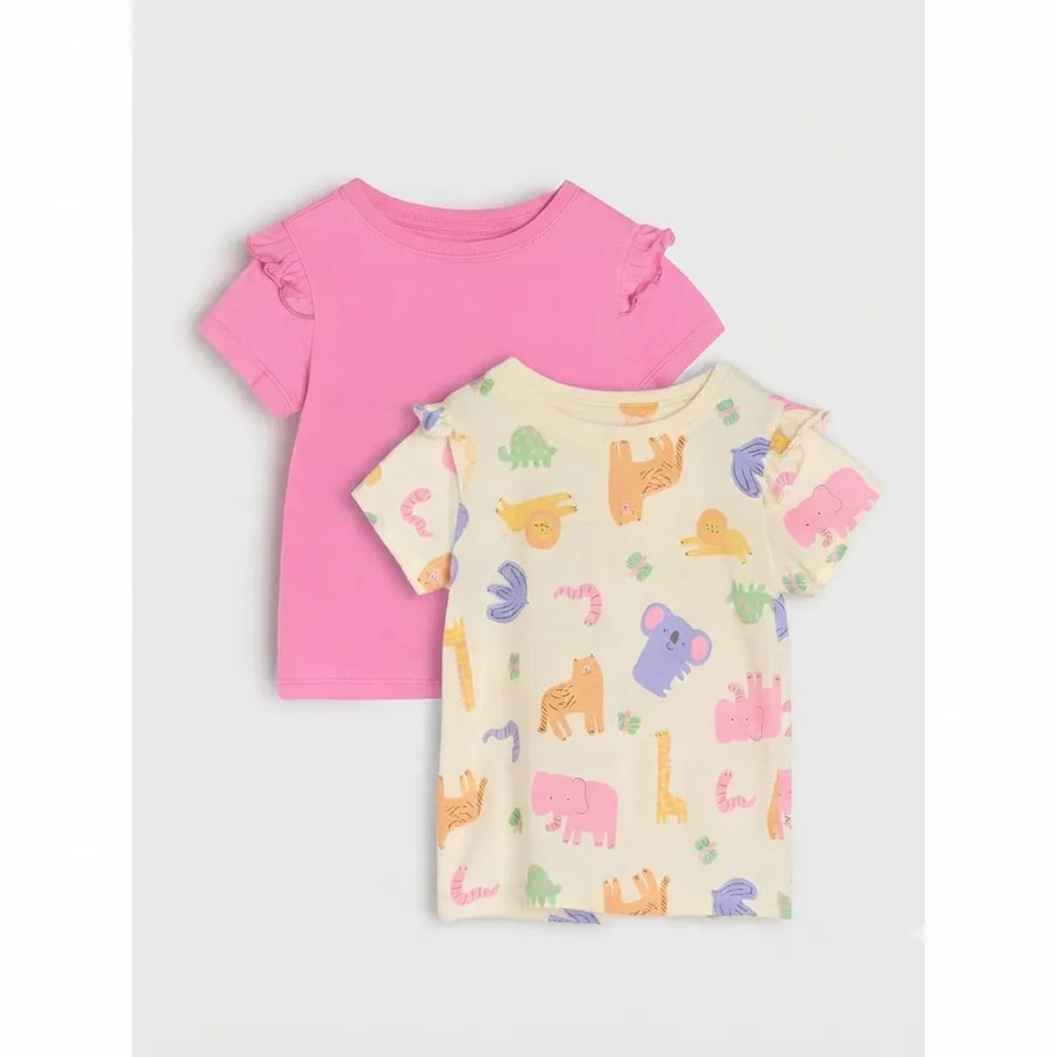 Two children's short-sleeve t-shirts with ruffle details on the sleeves, displayed in a flat-lay arrangement. The back shirt is solid pink, and the front shirt is cream-colored with a colorful cartoon animal print.