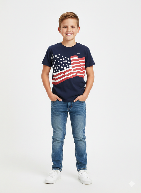 Child wearing a navy t-shirt with an American flag design and blue jeans on a white background