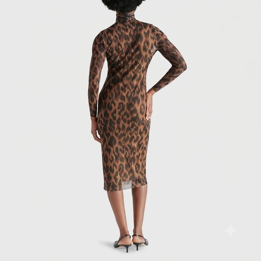 A woman modeling a long-sleeve mock-neck midi dress with a brown and black leopard print pattern, shown from the back against a light gray studio background.