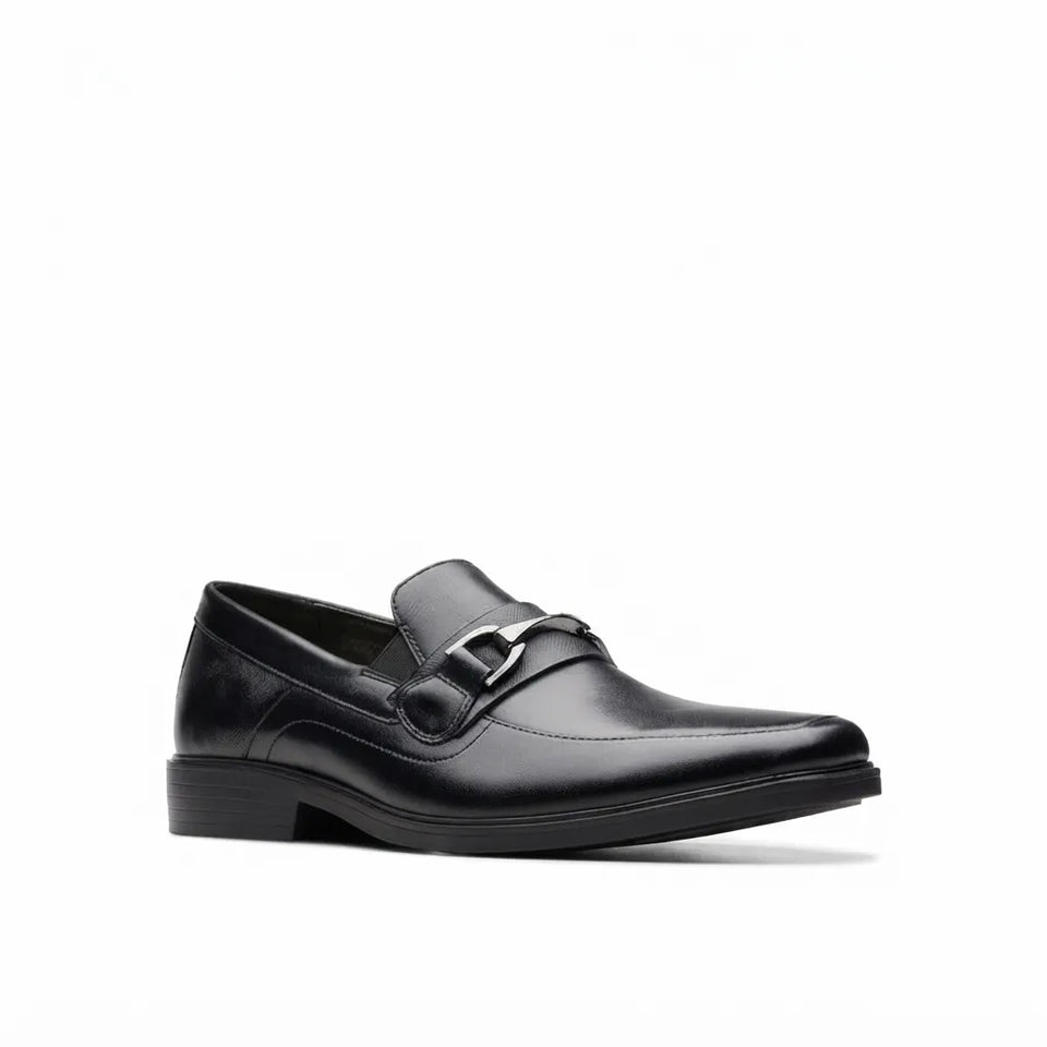 A single burgundy leather loafer with a black platform sole and a gold-tone horsebit detail on the strap, shown in profile against a plain white background.