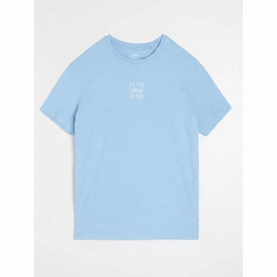 A light blue short-sleeve crewneck t-shirt with small white text on the left chest reading 'IT'S TRUE I Dream of blue', displayed flat against a light gray background.