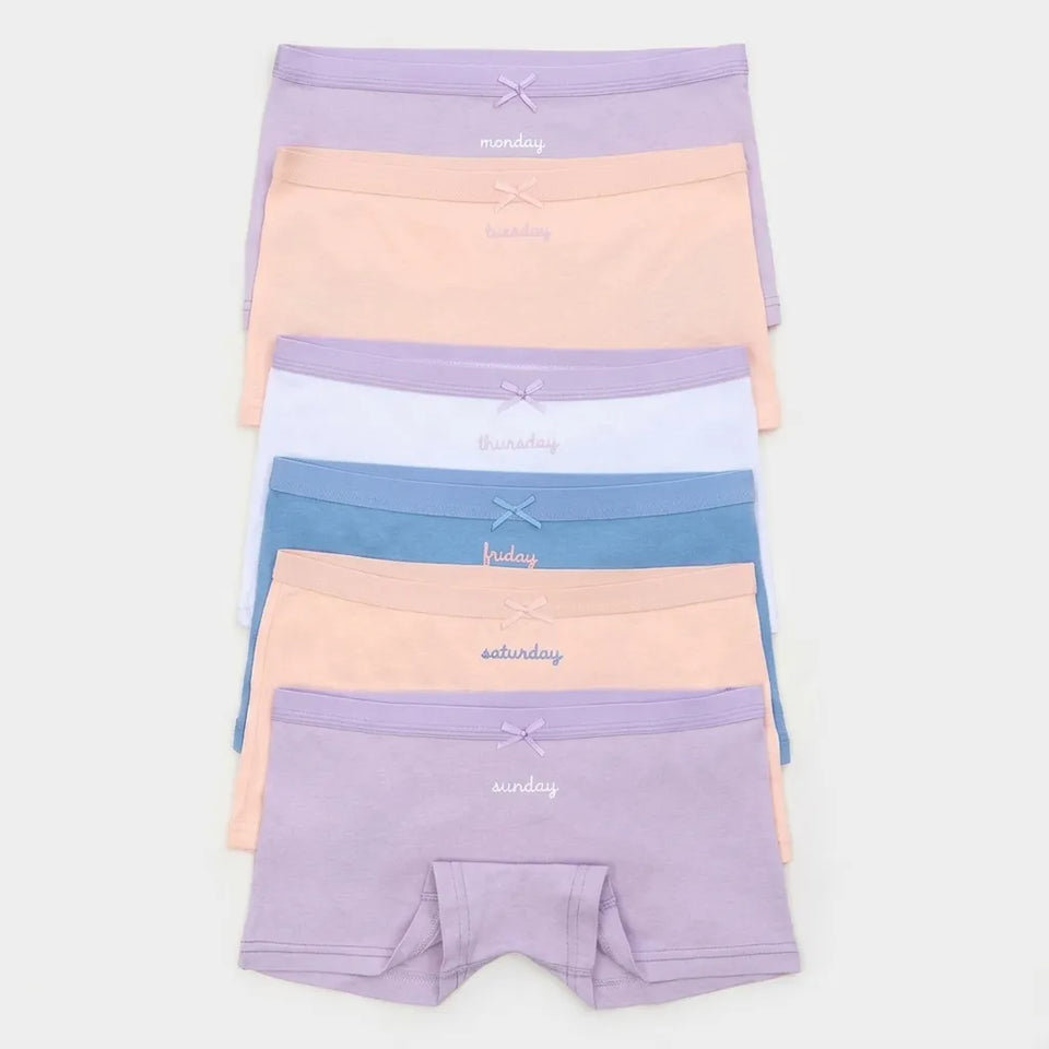 A set of six women's high-waisted briefs in a pastel weekday color palette, arranged in a vertical stack. The colors include lavender (Monday), peach (Tuesday), white (Wednesday), blue (Thursday), peach (Friday), and lavender (Saturday).