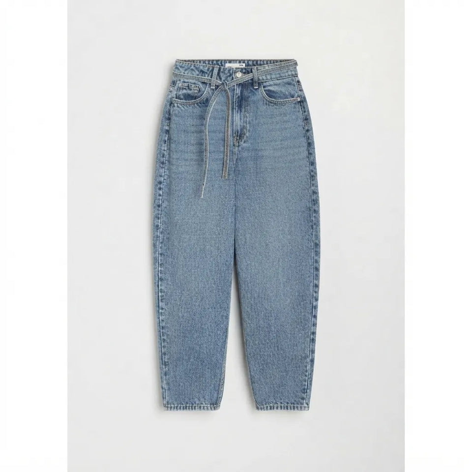 Light blue denim jeans with a drawstring waist, laid flat against a light gray background.