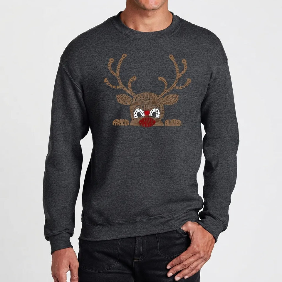 A man wearing a dark heather gray crewneck sweatshirt with a brown reindeer graphic on the chest, paired with black jeans, against a light gray background.