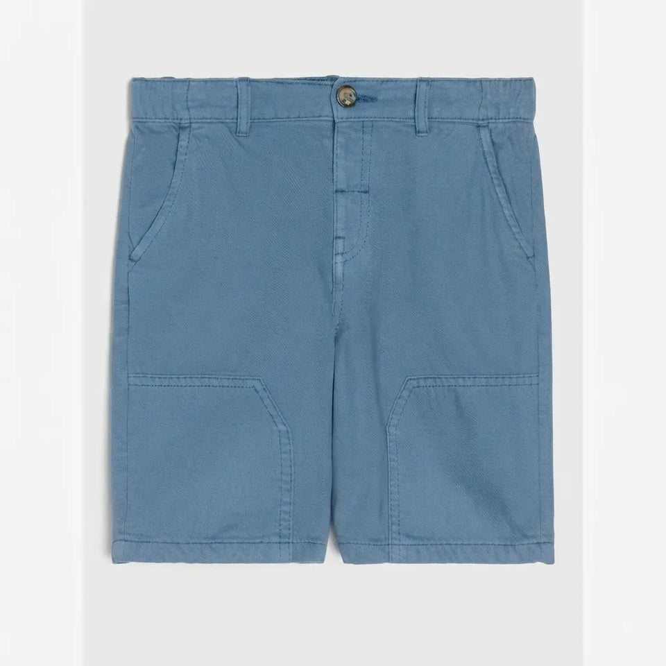 A pair of light blue denim shorts with a button closure, belt loops, side pockets, and two large patch pockets on the front, shown flat against a light gray background.