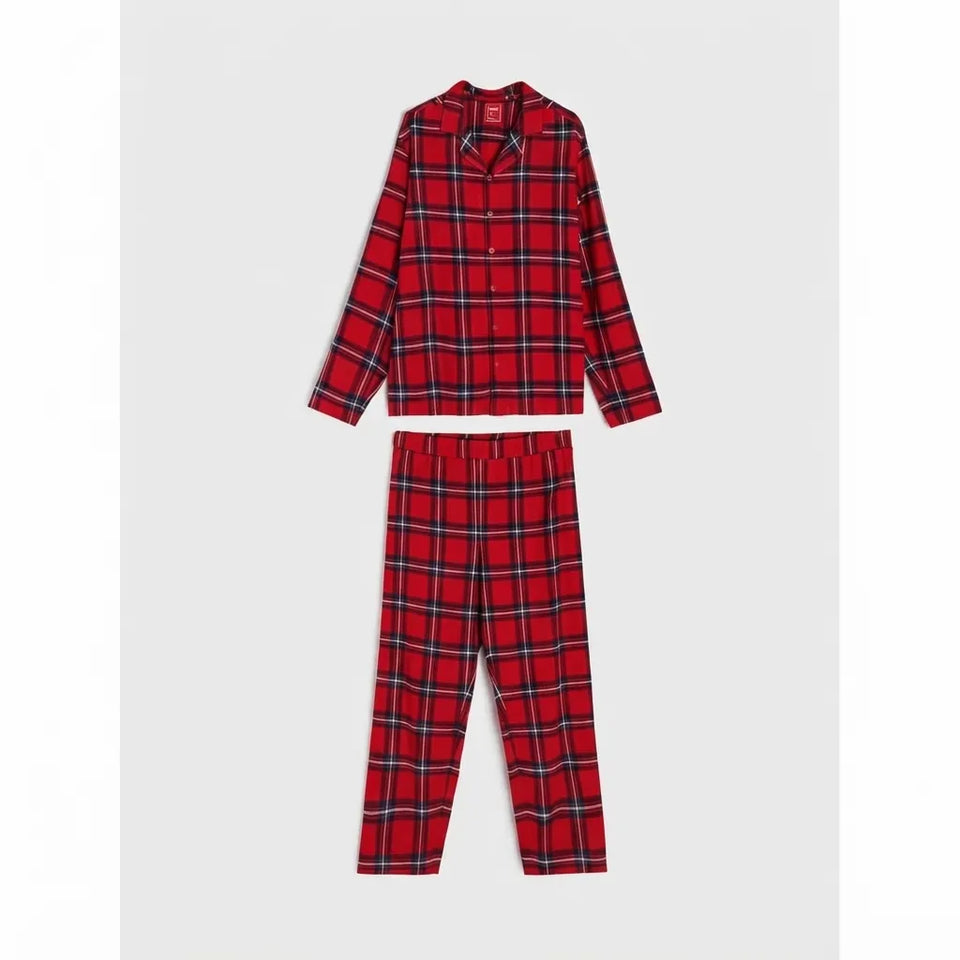 A two-piece children's pajama set featuring a long-sleeve button-up shirt and matching pants in a red tartan plaid pattern with black and white stripes, displayed flat against a light gray background.
