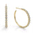 A pair of gold hoop earrings adorned with clear round-cut rhinestones set along the outer edge, shown on a clean white background.