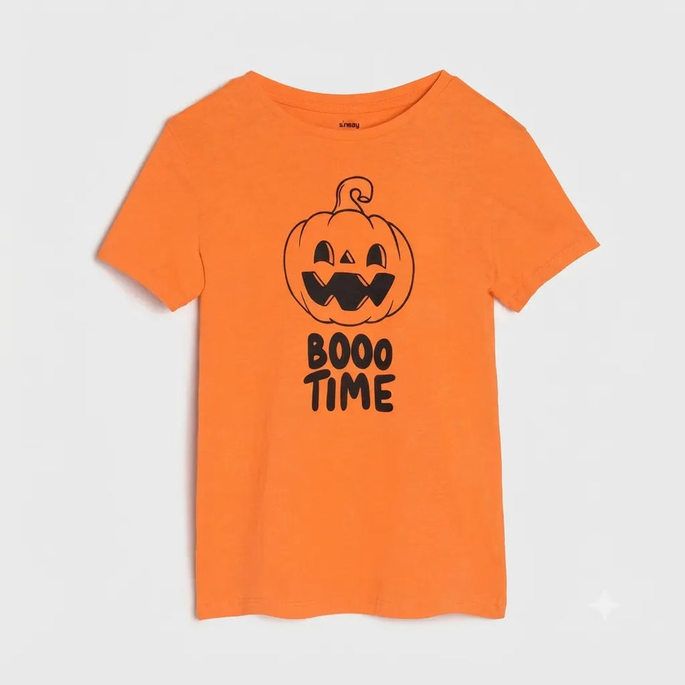 An orange short-sleeve t-shirt with a black graphic of a smiling jack-o'-lantern and the text 'BOOO TIME' printed on the front, displayed against a light gray background.