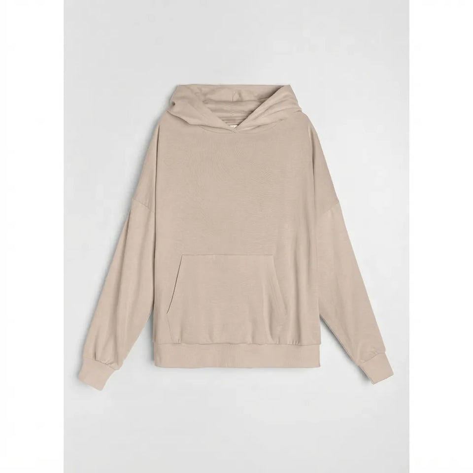 A light beige pullover hoodie with a front kangaroo pocket, displayed flat against a light gray background.