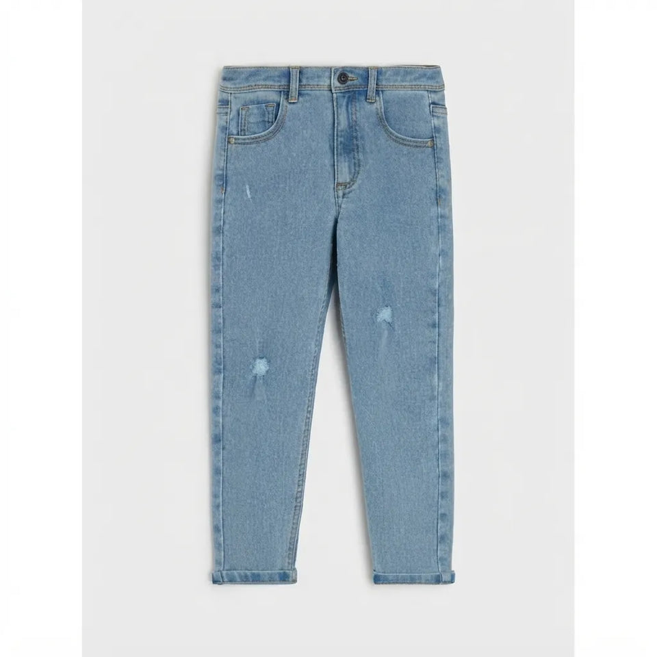 Light blue denim skinny jeans for kids, featuring a straight-to-cropped leg, classic five-pocket design, and subtle distressed rips on the thighs and knees, shown flat on a light gray background.