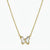 A delicate gold chain necklace featuring a butterfly pendant with clear, faceted crystal wings set in gold, shown against a plain white background.