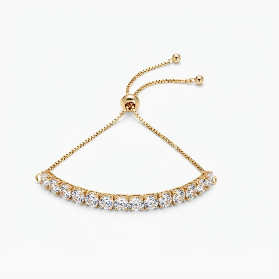 A gold adjustable bracelet featuring a curved row of clear round-cut stones, photographed on a clean white background.