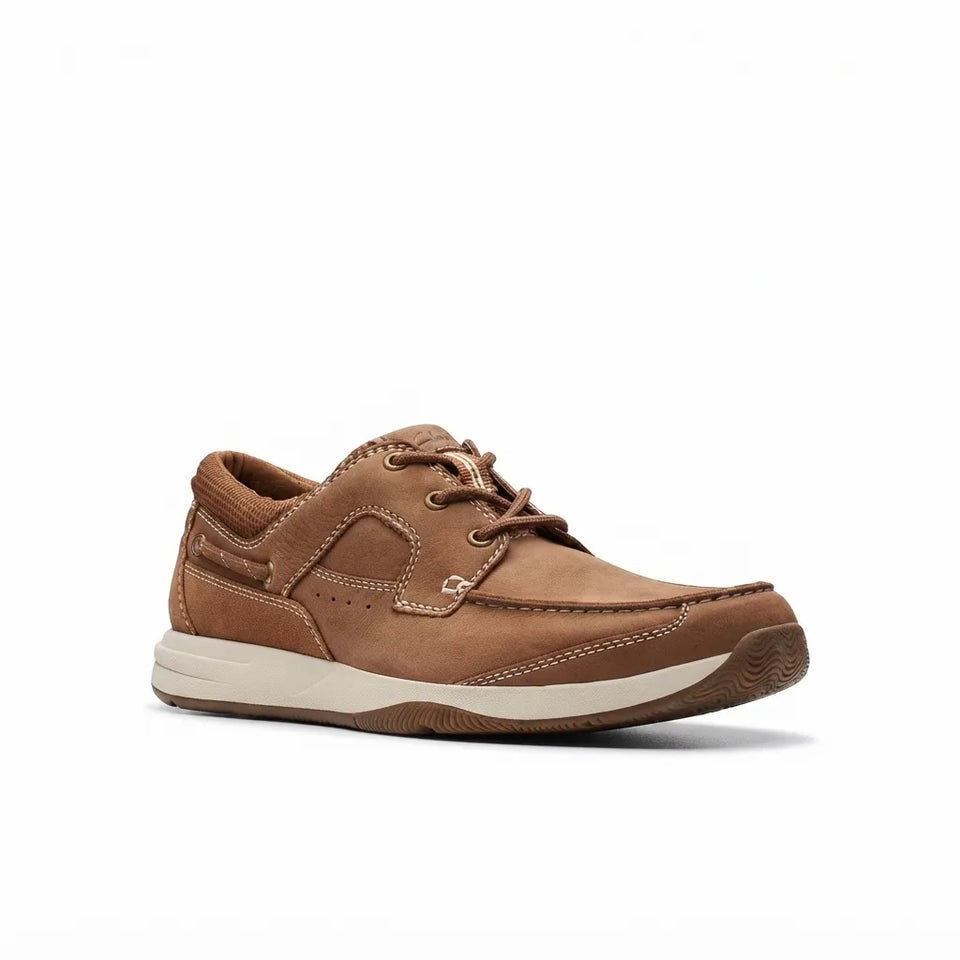 A brown leather lace-up shoe with a thick cream-colored midsole and a brown outsole, shown from a side profile on a white background.