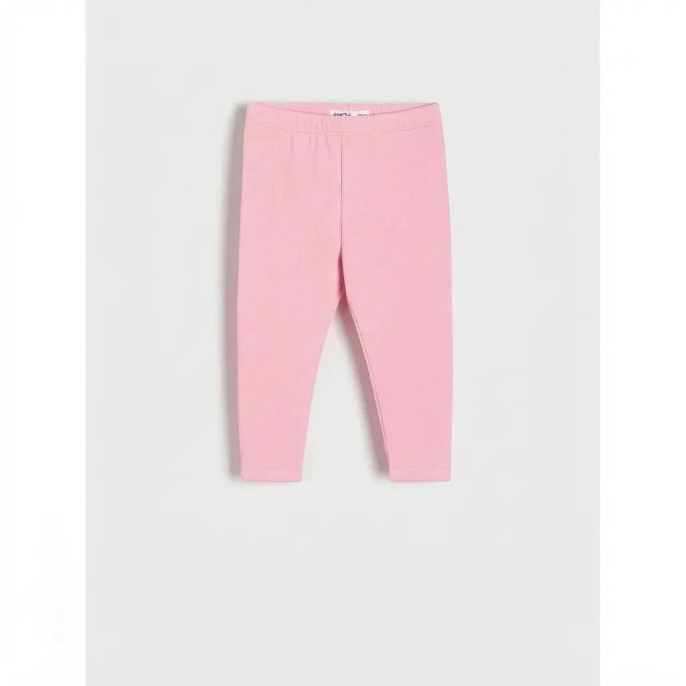 A pair of children's pink leggings with an elastic waistband, shown flat against a light gray background.
