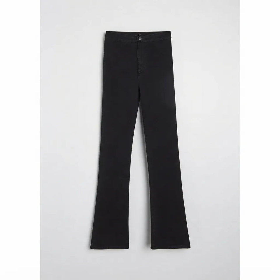 Black flare jeans shown flat against a light gray background.