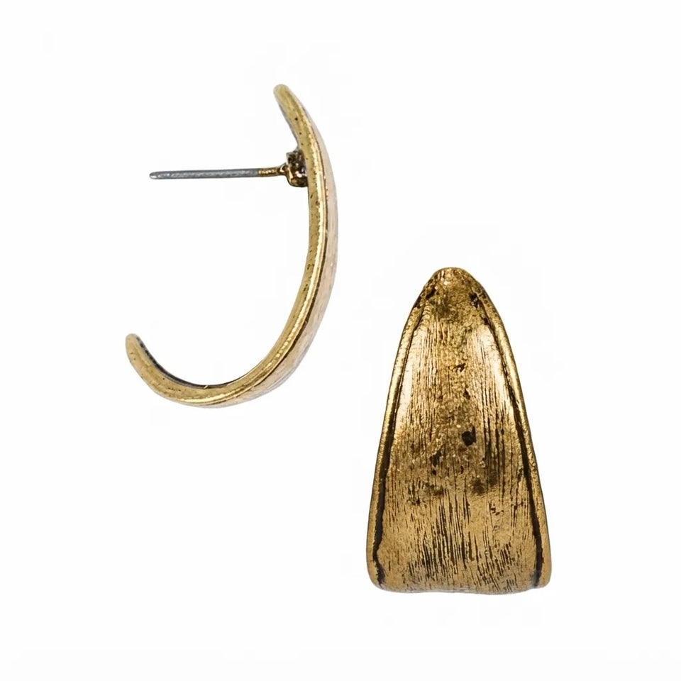 A pair of textured gold-tone earrings on a plain white background, showing one curved post earring and one teardrop-shaped stud earring.