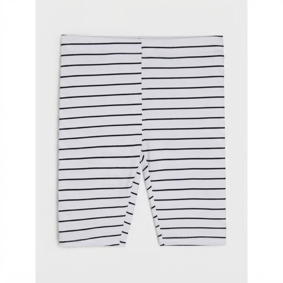 White cropped leggings with thin black horizontal stripes, shown flat against a light gray background.
