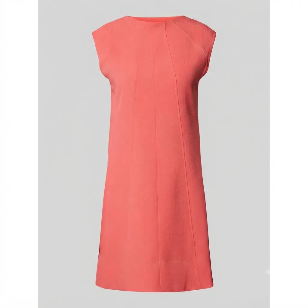 A sleeveless coral pink dress with a straight, A-line silhouette and a crew neckline, shown against a solid light gray background.