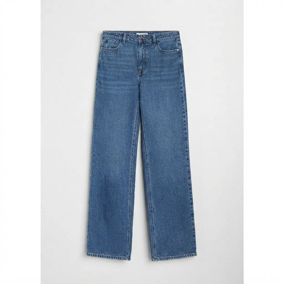 A pair of medium-wash blue denim jeans with a straight-leg fit, shown flat against a light gray background.