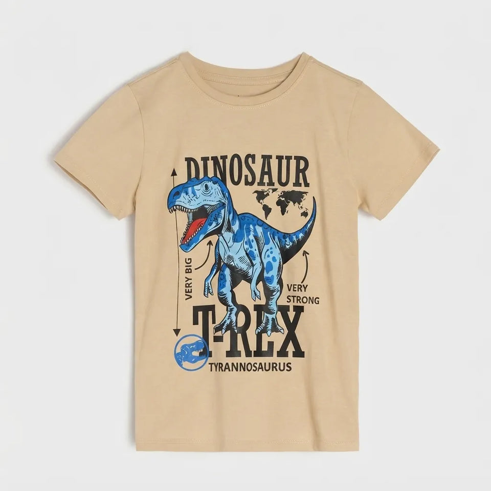 A beige short-sleeve kids' t-shirt featuring a blue and black graphic of a T-rex dinosaur with text reading 'DINOSAUR T-REX TYRANNOSAURUS' on the front, displayed against a light gray background.